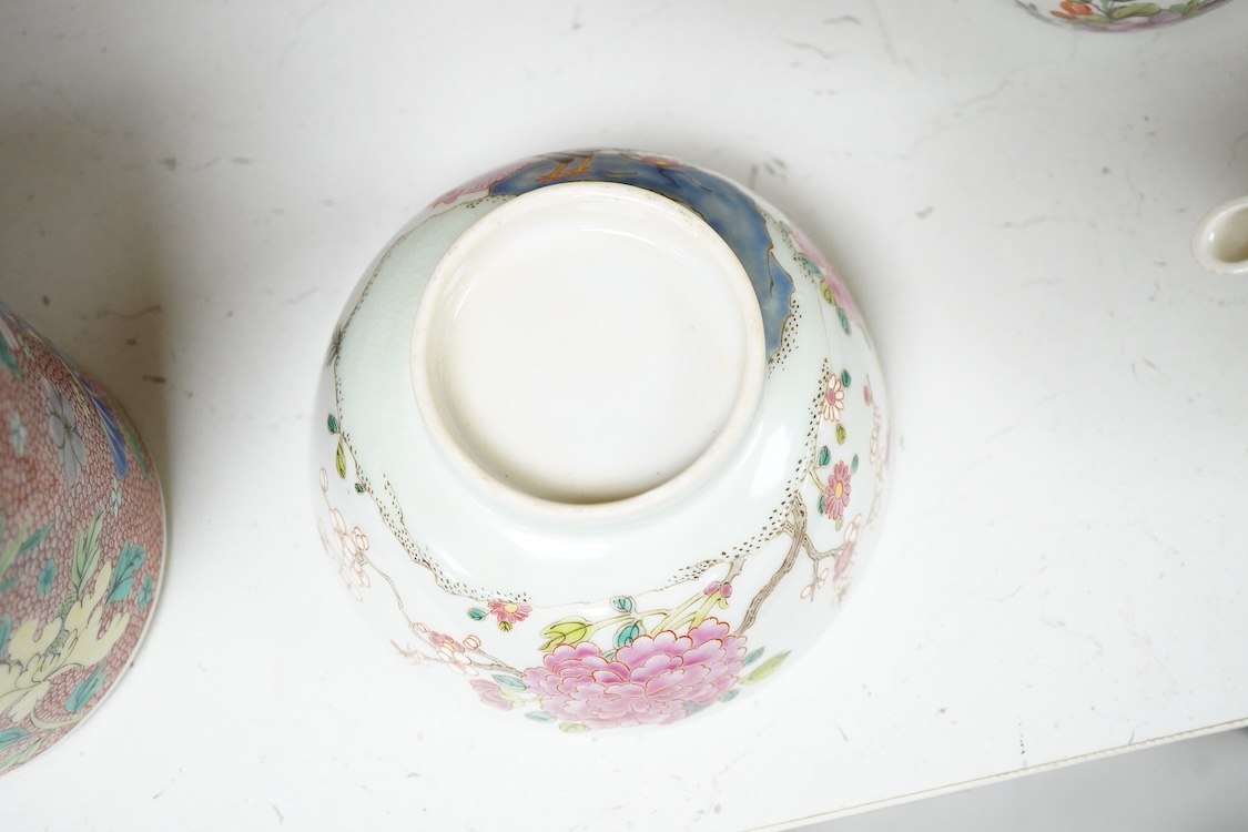 A Chinese famille rose bowl enamelled with a chicken amongst flowers, 12.5cm in diameter